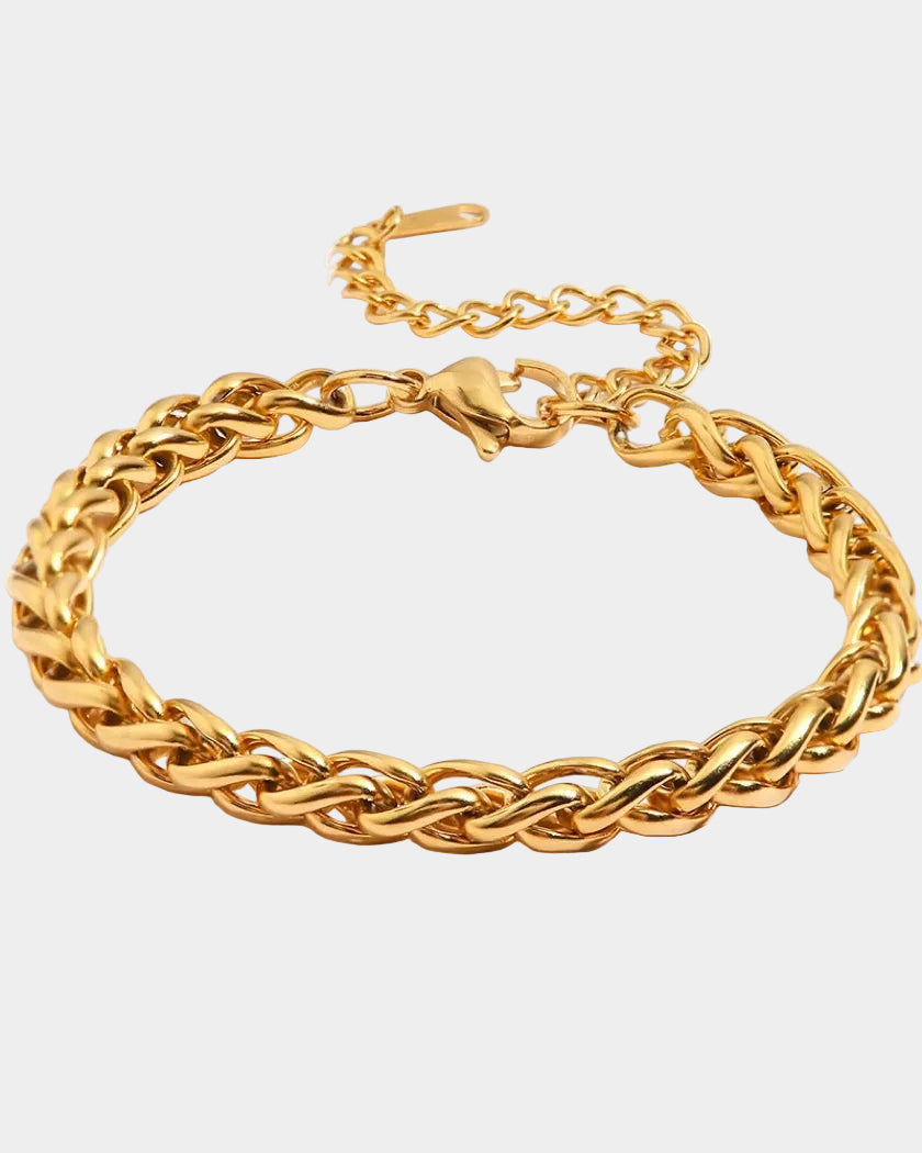Gold chain bracelet on a white background