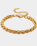Gold chain bracelet on a white background